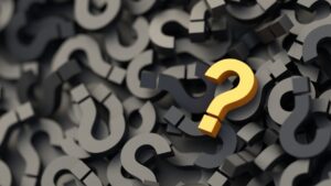 pile of black question marks with single yellow questions mark on top