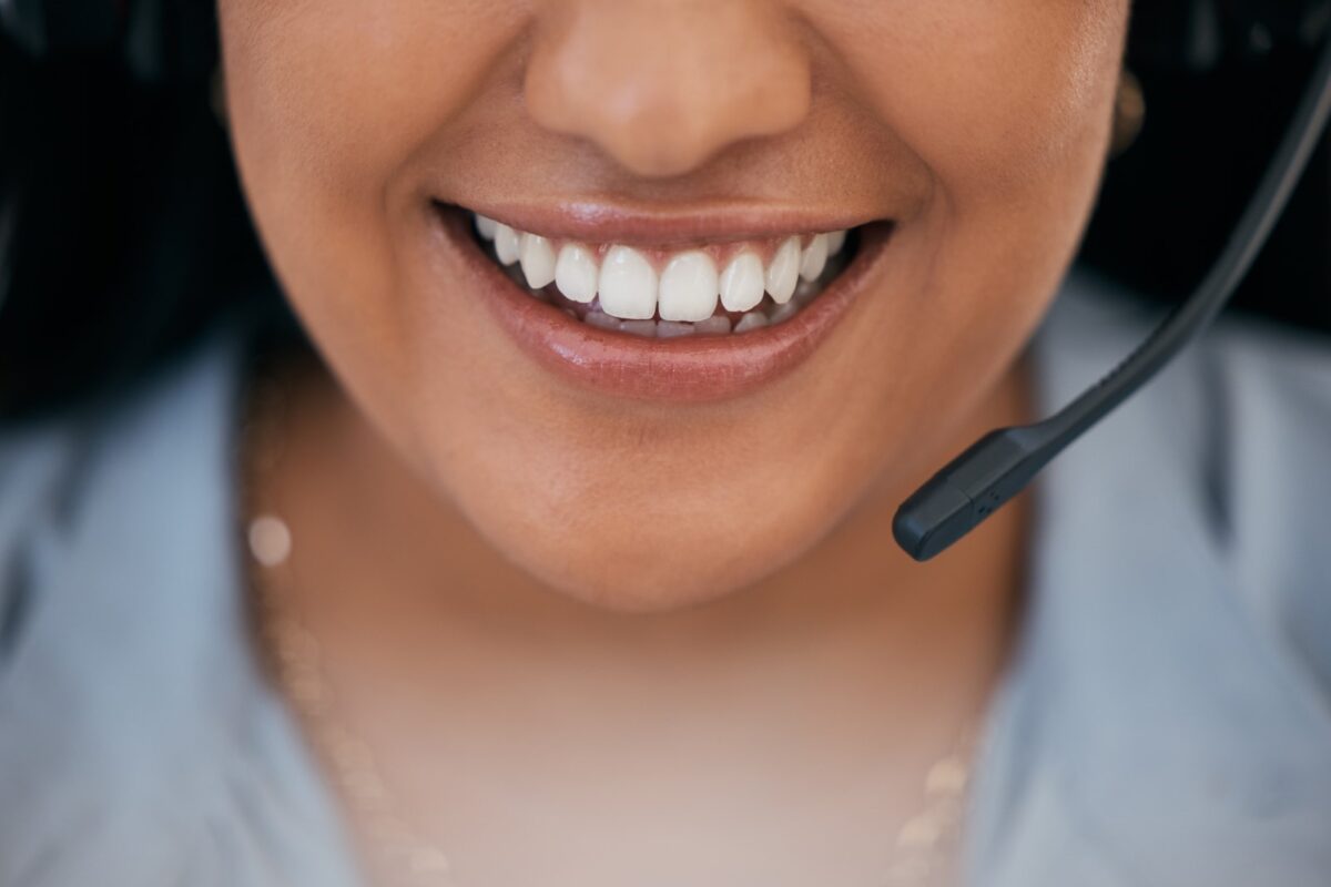 mouth of woman using a business telecoms VoIP headset